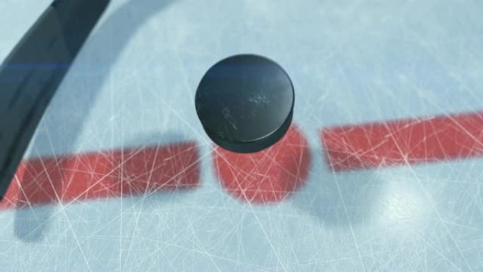冰球落在冰上，曲棍球棒将其取出。慢动作特写美丽的3d动画，有和没有dop模糊和镜头耀斑。主动运动概念