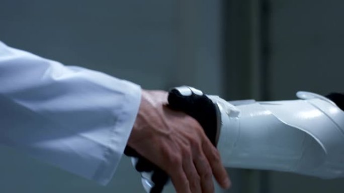 人和机器人握手人工智能机器人