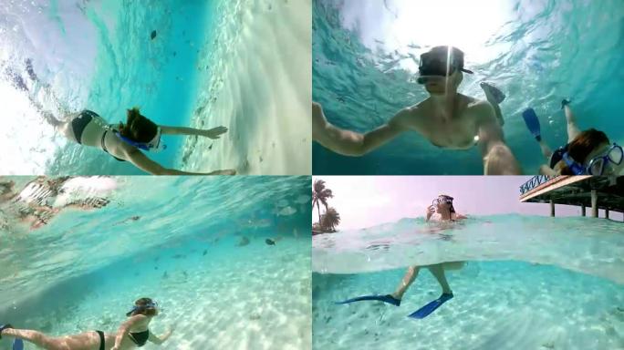 MS夫妇与可穿戴相机在马尔代夫的热带海洋浮潜