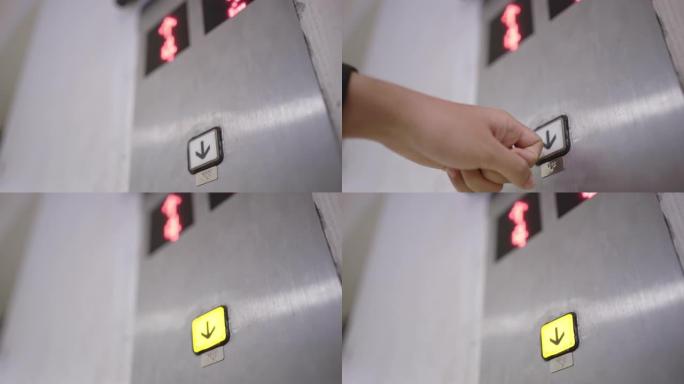 手用指关节按下电梯的按钮，因为新型冠状病毒肺炎或电晕病毒是看不见的
