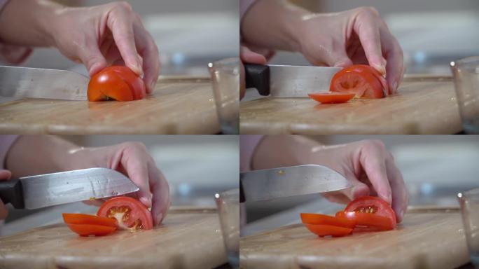 女人的手切番茄
