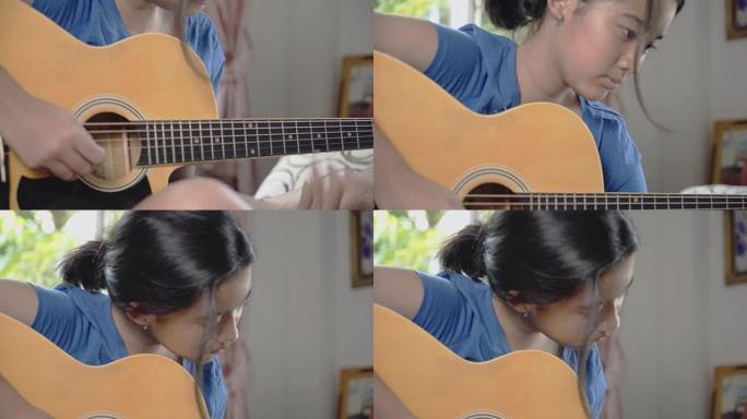 亚洲青少年女孩演奏原声吉他乐器