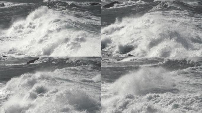 岩石海岸附近的风暴波。慢动作镜头。