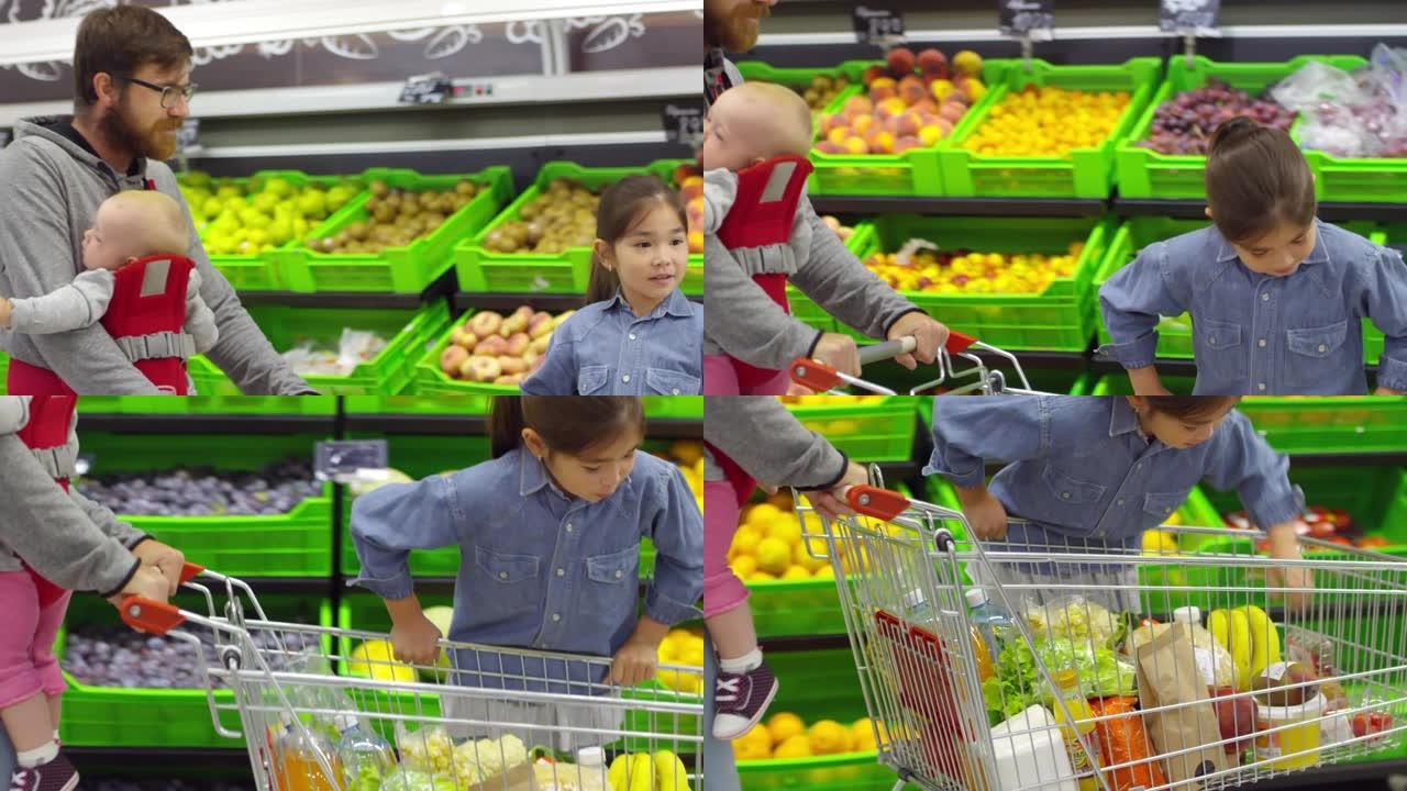 男子带着两个孩子在超市购物