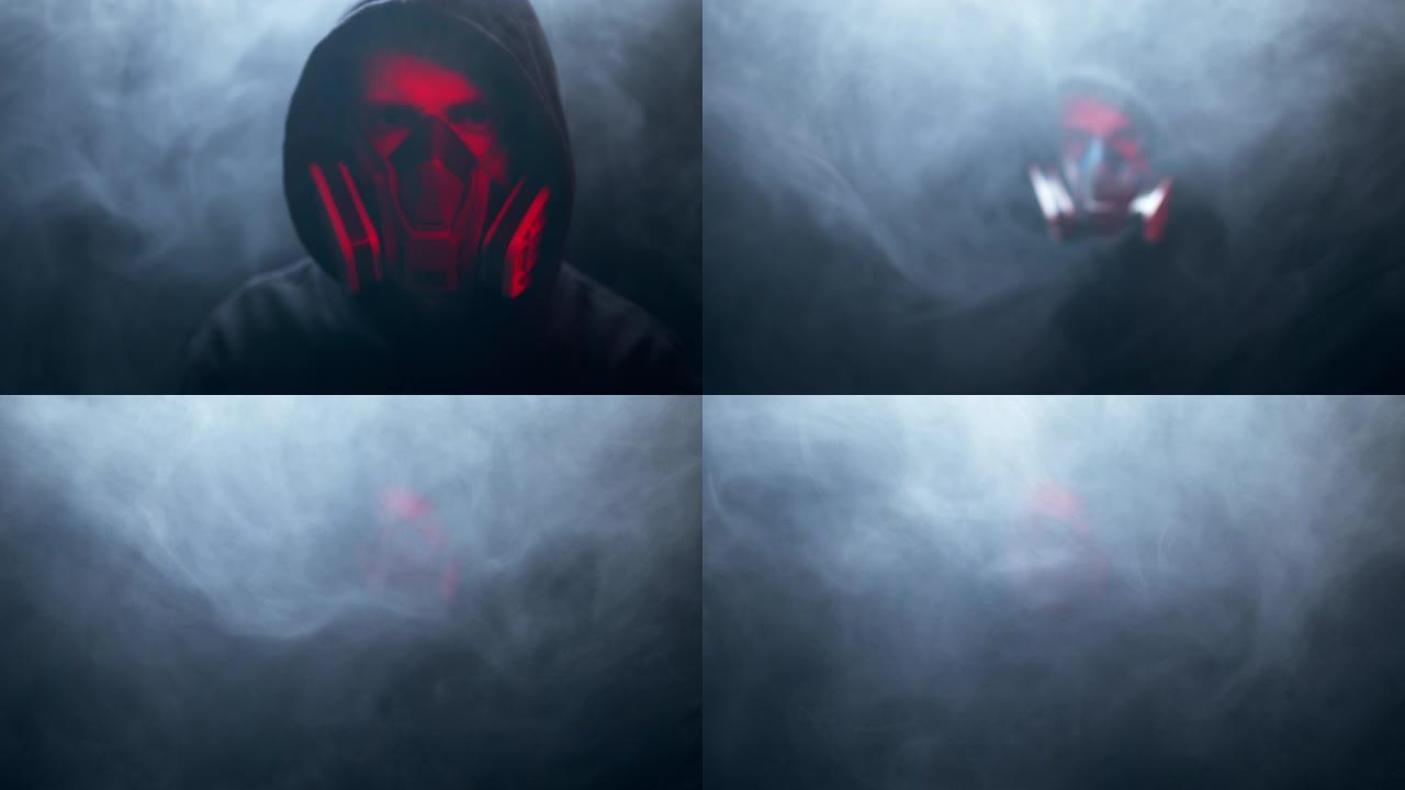 一名戴着化学防护面罩的男子被红灯照亮