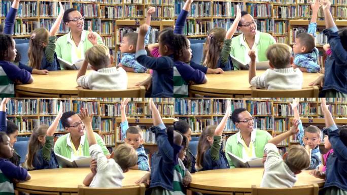 老师，图书馆的小学生举手