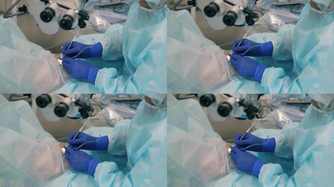 专业外科医生在进行眼科手术时使用设备。