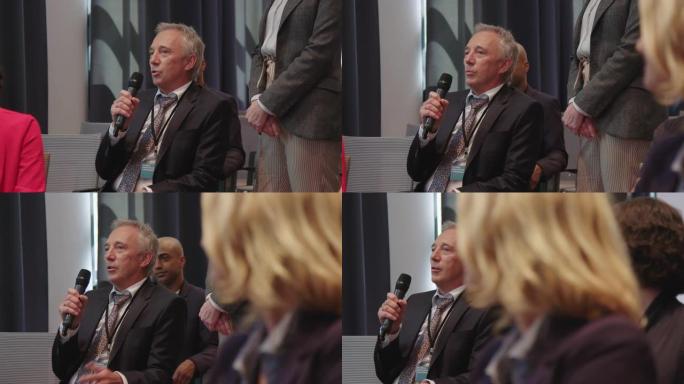 商人在酒店研讨会上发言