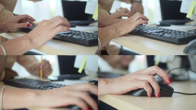 女商人在计算机键盘上打字并使用计算机鼠标，慢动作