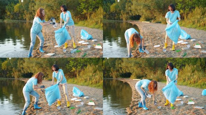 开朗的女孩志愿者在海滩上收集垃圾谈论清洁