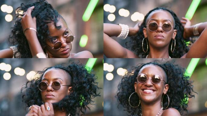 时尚的年轻黑人妇女在玩她的头发和笑，特写，低角度，背景中的波克灯