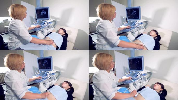 对一名年轻孕妇进行超声波检查