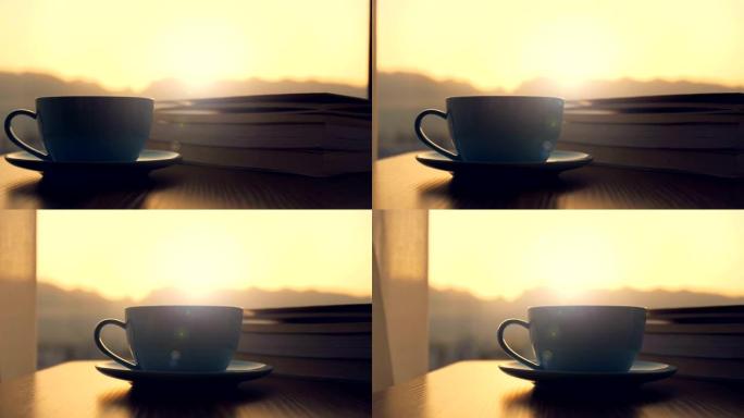 带书的咖啡时间清晨喝咖啡杯子书籍