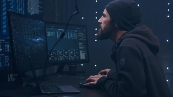 电脑黑客。网络犯罪在黑色数字背景的笔记本电脑屏幕上编写代码。网络攻击在网络空间的概念