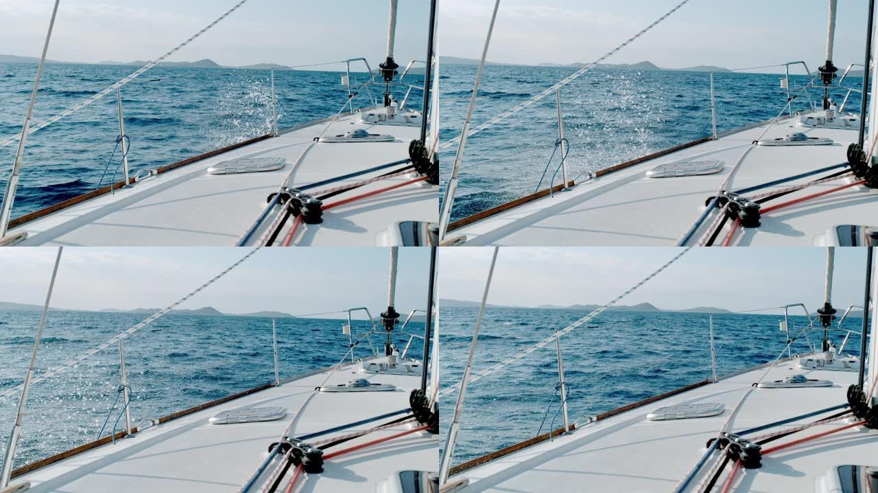 MS超级慢动作，帆船沿着克罗地亚阳光明媚的蓝色海洋行驶