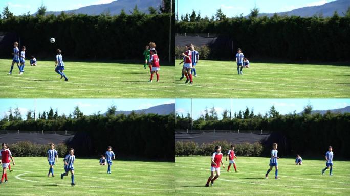 拉丁美洲男孩在足球夏季训练营中享受比赛