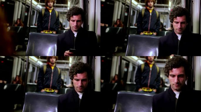 英俊的商人坐在火车上使用智能手机