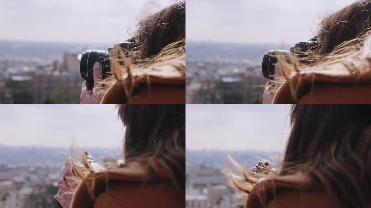 特写年轻美丽的女记者从蒙马特视点慢动作拍摄巴黎城市全景。