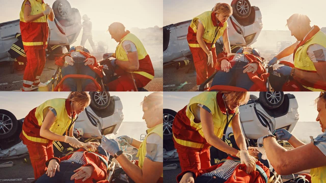 在车祸交通事故现场: 医护人员挽救了躺在担架上的女性受害者的生命。他们听心跳，戴上氧气面罩并进行急救