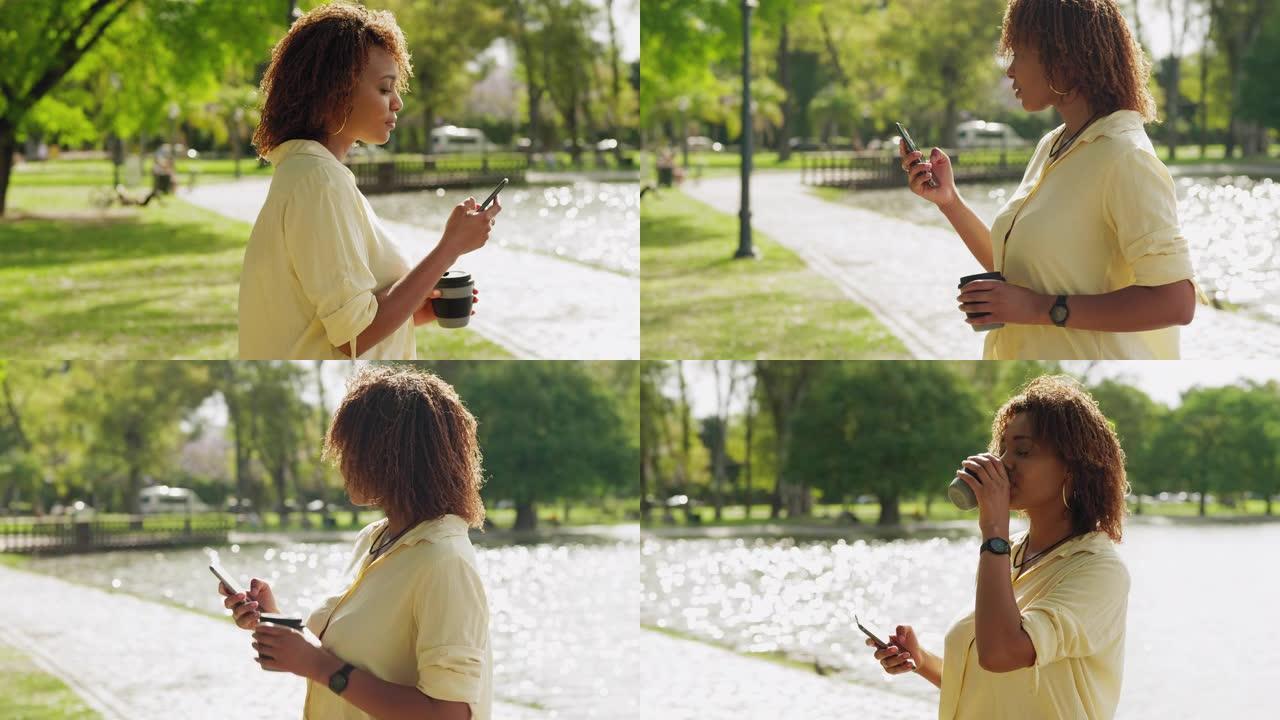 年轻女子正在用智能手机发短信时穿过公园