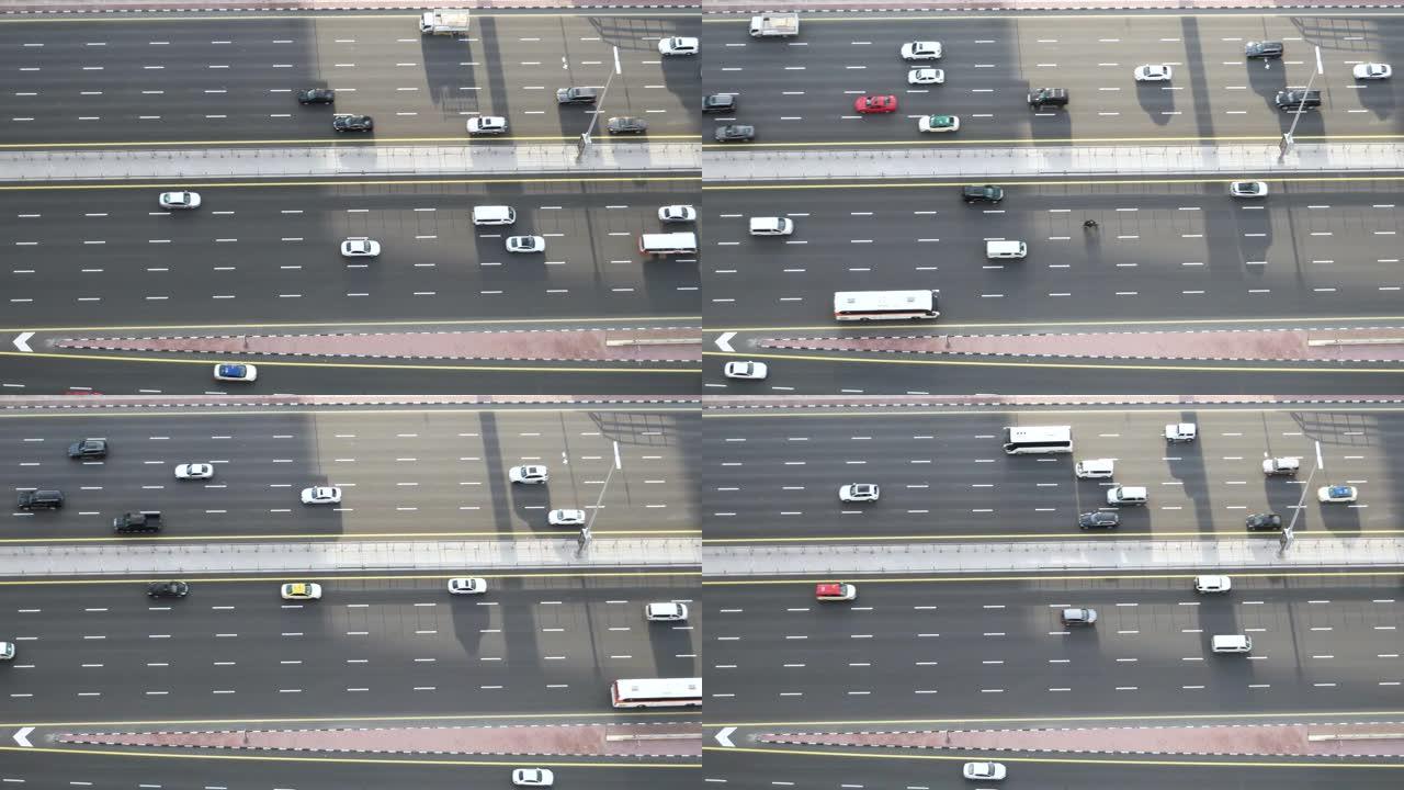 阿联酋迪拜高速公路上城市交通的俯视图