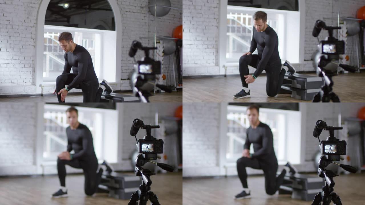 男性健身教练在相机上展示提升的弓步