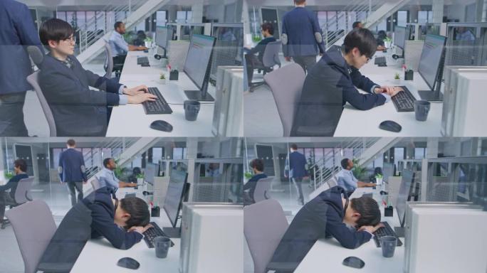 年轻的日本经理在台式电脑的工作场所很累，睡着了。在现代开放式办公室中，多元化的多民族商人在计算机上工