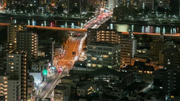 从日本东京晴空塔出发，在夜间高峰时段，东京城市景观的4k时间流逝与各种建筑摩天大楼和交通道路交叉路口