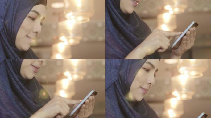 亚洲穆斯林妇女喜欢手机
