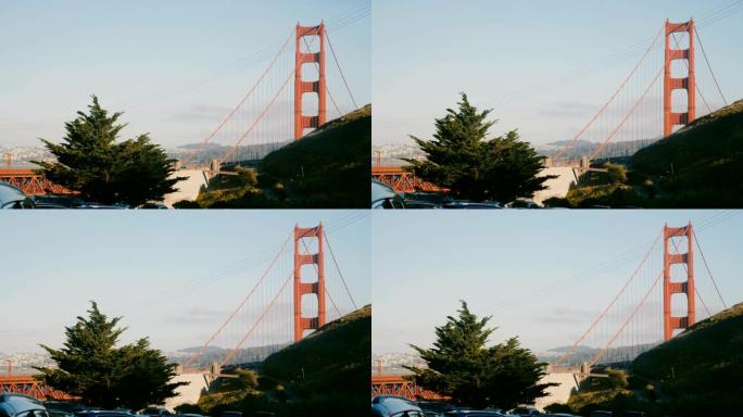 在一个晴朗的夏日，从停车场可以看到美国旧金山金门大桥的美丽日落。