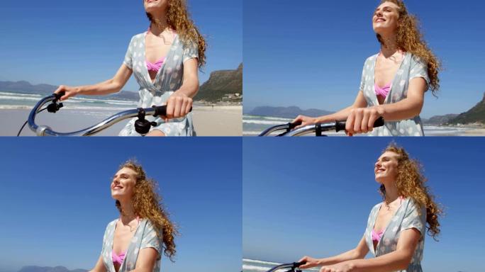阳光明媚的一天，情侣在海滩骑自行车4k