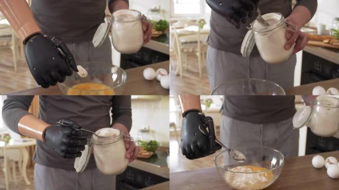 男子用肌电假肢在家里做饭