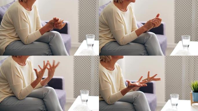 老年妇女在与心理学家的治疗过程中说话和打手势