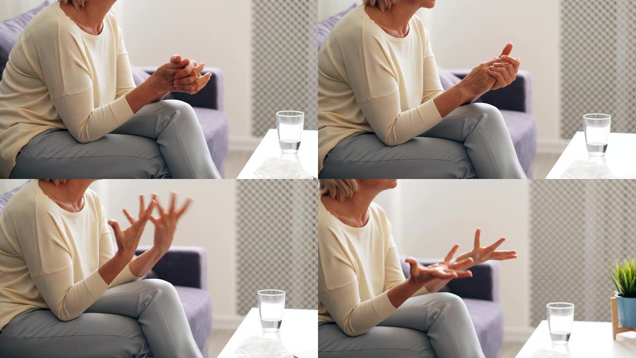 老年妇女在与心理学家的治疗过程中说话和打手势