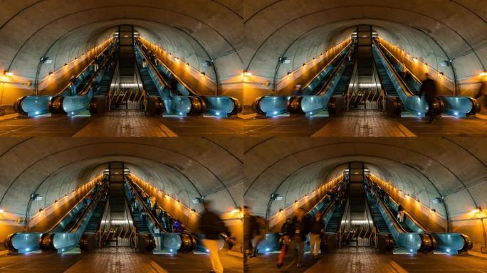 延时: 旅行者行人拥挤在美国华盛顿特区地铁站的自动扶梯上