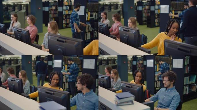大学图书馆: 多种多样的多民族学生从事计算机工作，学习，考试学习，写论文，研究课堂作业，与同学交谈。