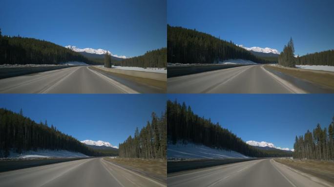 POV: 沿着高速公路行驶时未触及的山区荒野的风景镜头