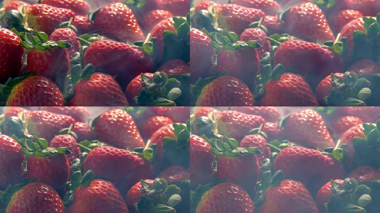 冰冷的草莓堆冰箱里草莓果冰鲜特写镜头