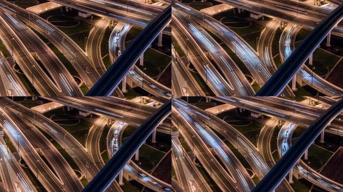 阿联酋迪拜夜间立交桥、地铁和城市交通的T/L ZO MS鸟瞰图