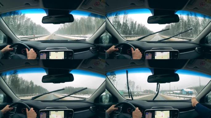 快速行驶中沿着雪道行驶的汽车的第一人称视角