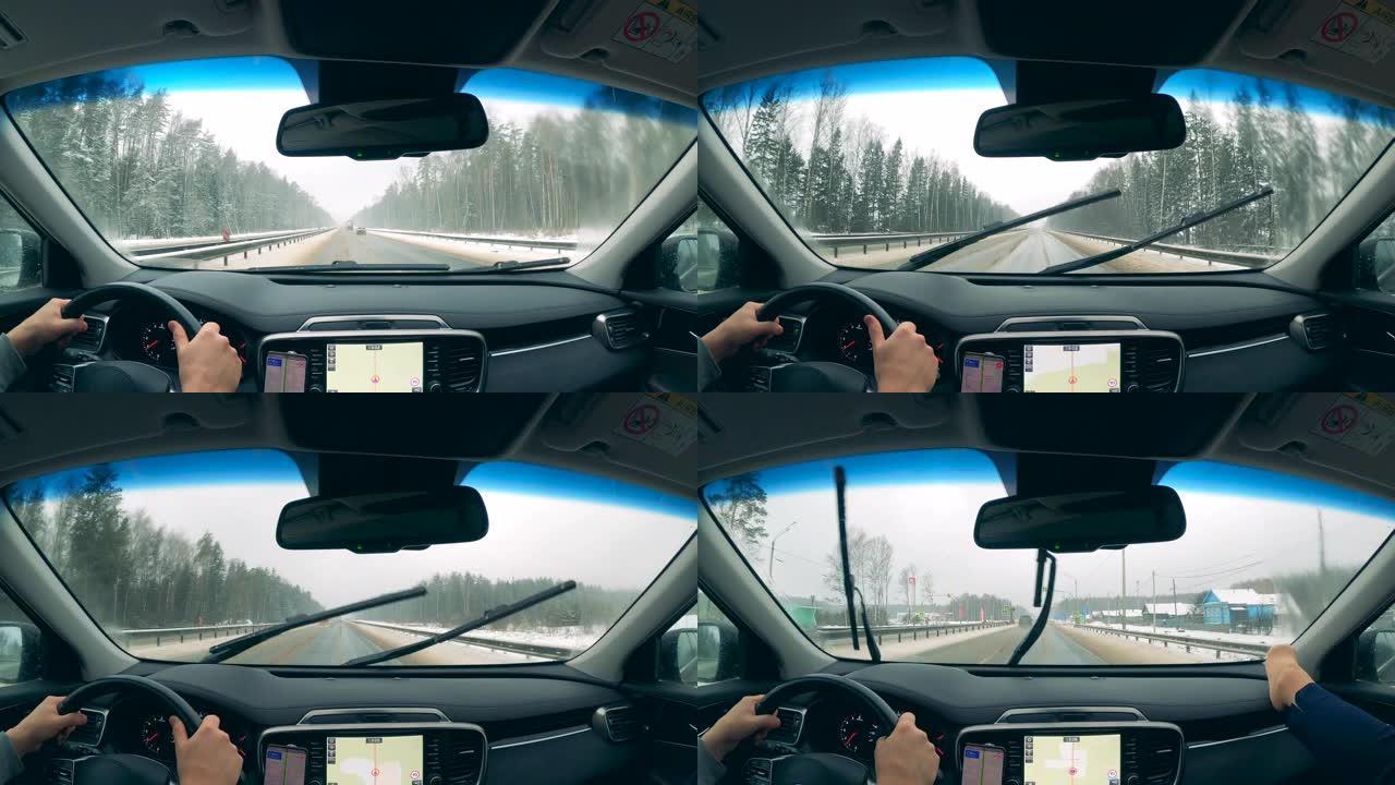 快速行驶中沿着雪道行驶的汽车的第一人称视角