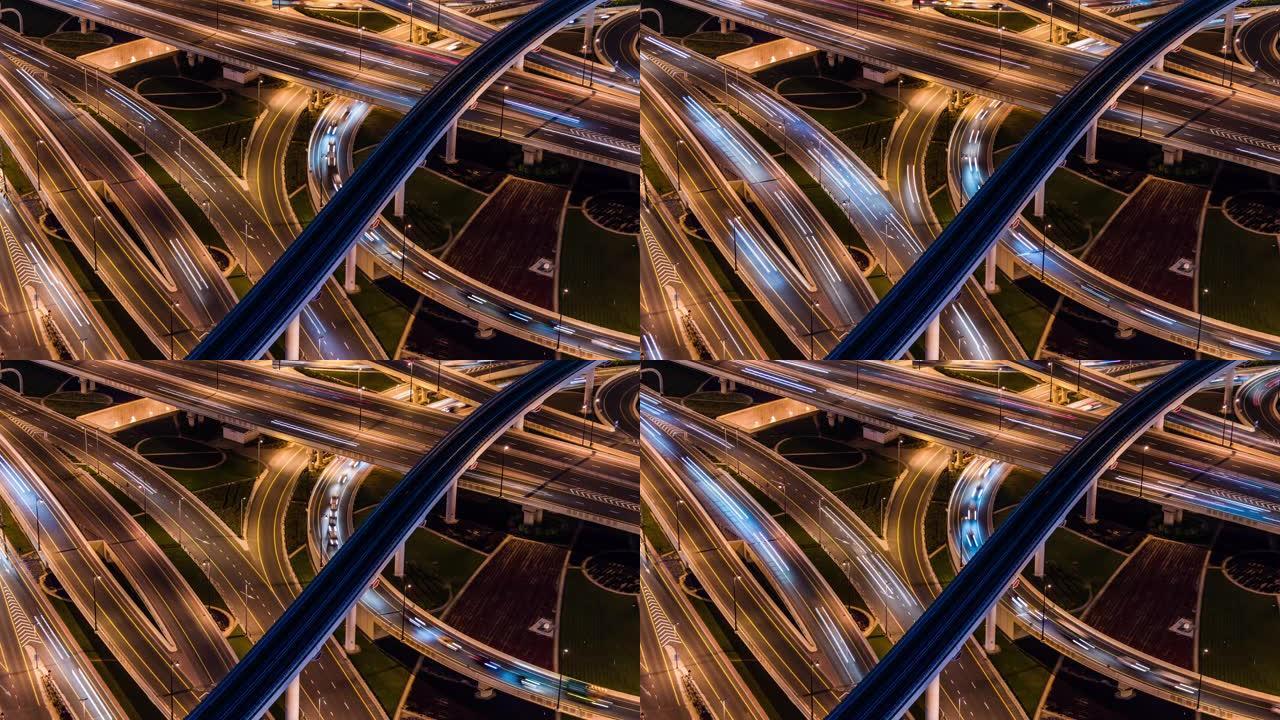 阿联酋迪拜夜间立交桥、地铁和城市交通的T/L MS鸟瞰图