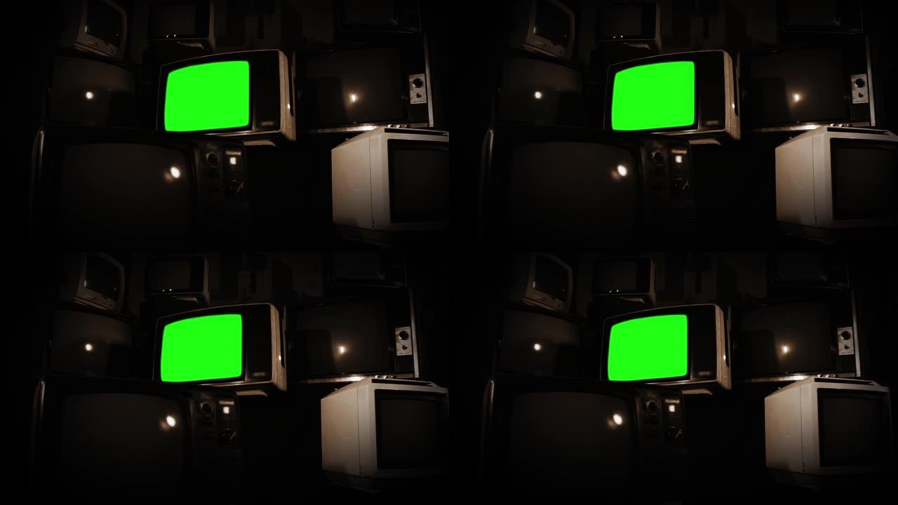 旧电视绿屏，有许多电视。棕褐色色调。缩小。