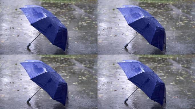4k雨季，地板上有蓝色雨伞