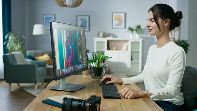 专业女摄影师在他的个人电脑上的照片编辑应用程序/软件工作。照片编辑修饰美丽女孩的照片。模拟软件设计。