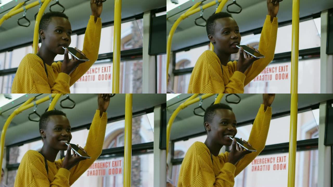 女人在4k公共汽车上旅行时用手机聊天