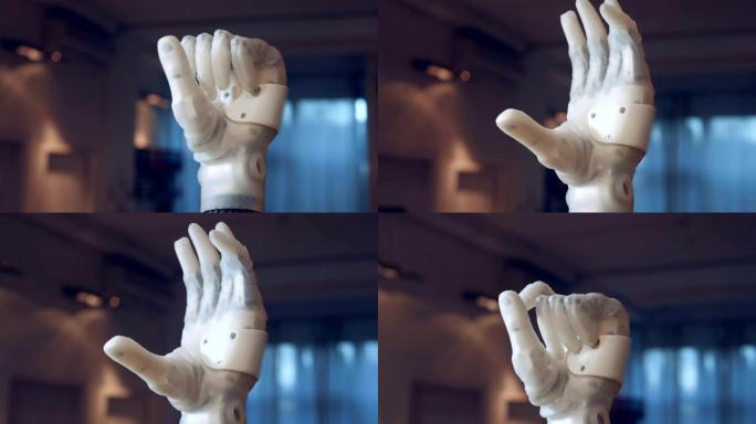 未来主义假肢弯曲手指，特写。