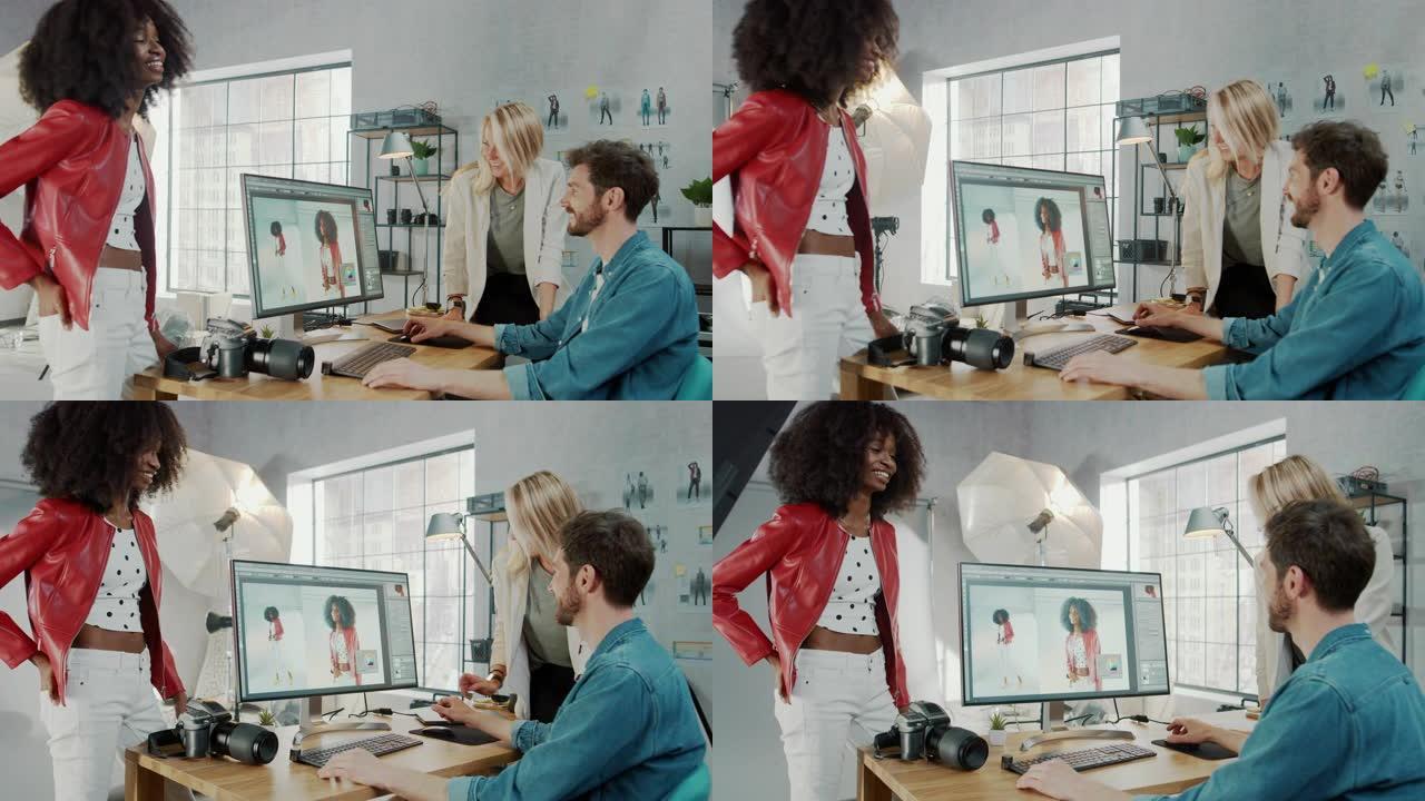 在照相馆时尚杂志设计师和美丽的黑色封面女孩与专业摄影师交谈，后者使用台式计算机在图像编辑软件中修饰照