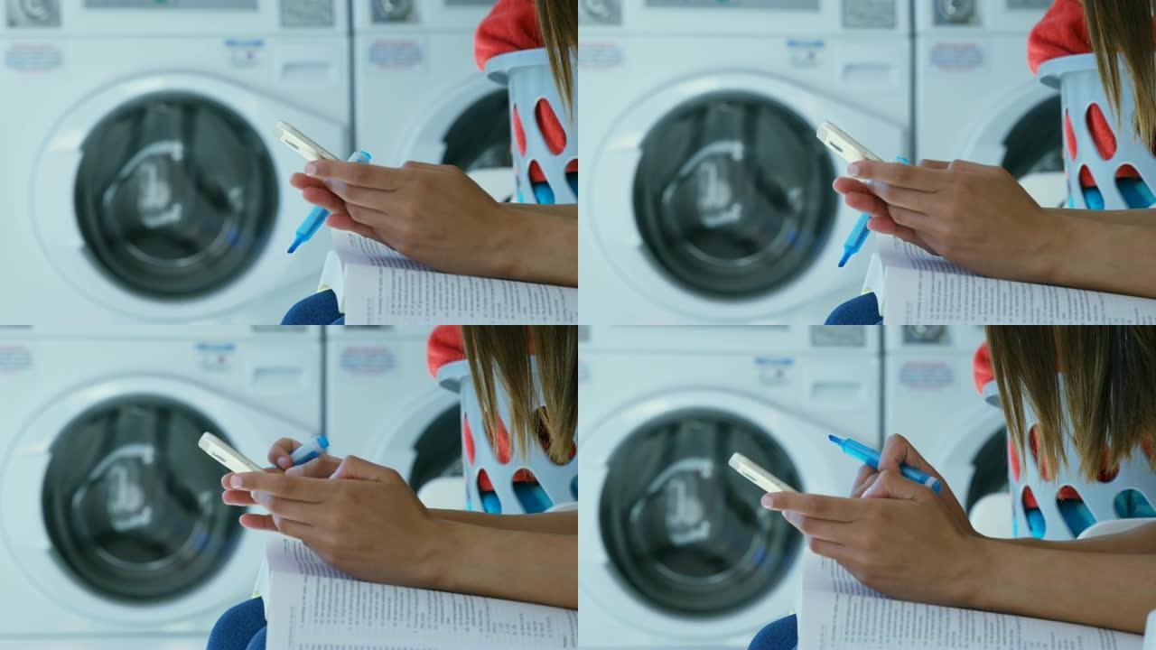 在4k自助洗衣店使用手机的女人