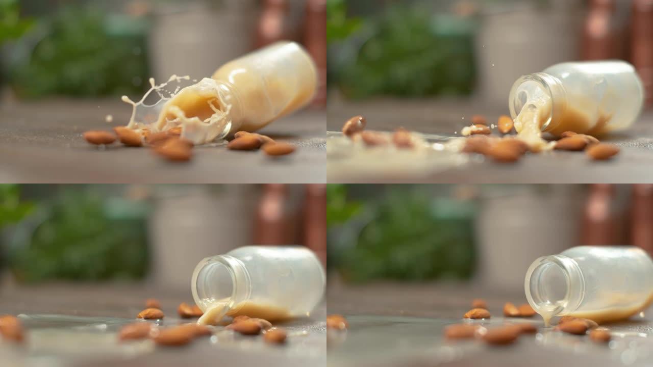 慢动作，宏观: 新鲜的杏仁奶溢出到生有机杏仁上。